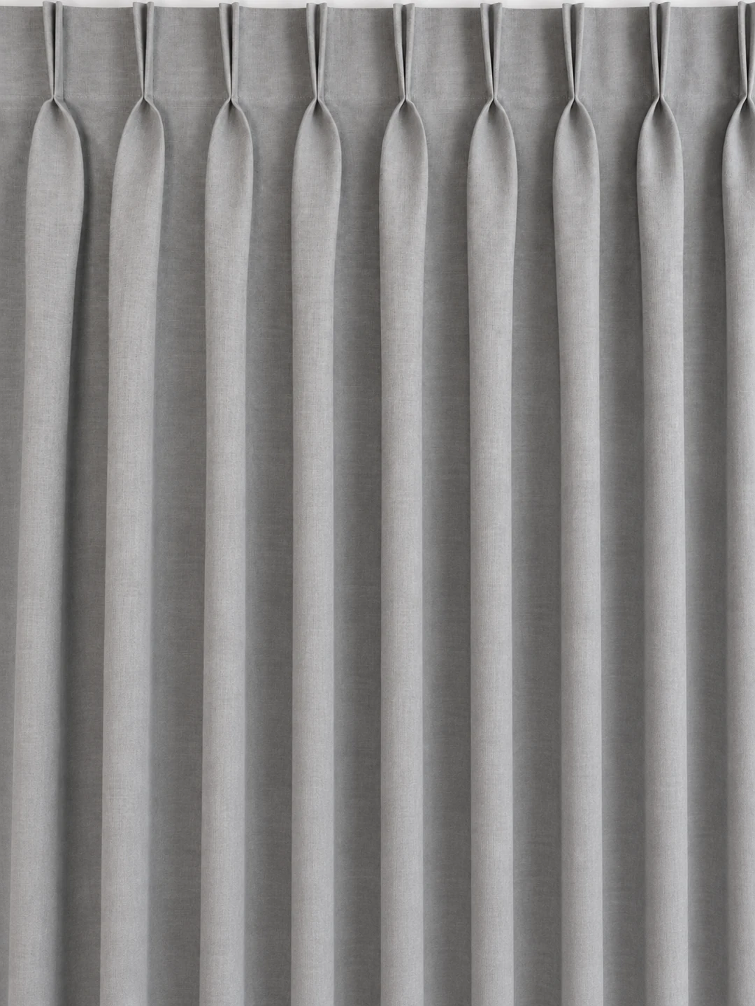 Full-length grey linen curtains with evenly spaced, clean two-fold double-pleat headings.