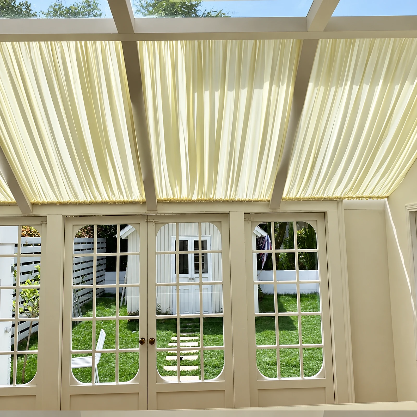 Gathered canopy cloth & its finishing edge — close-up of the supplied curtain photograph.