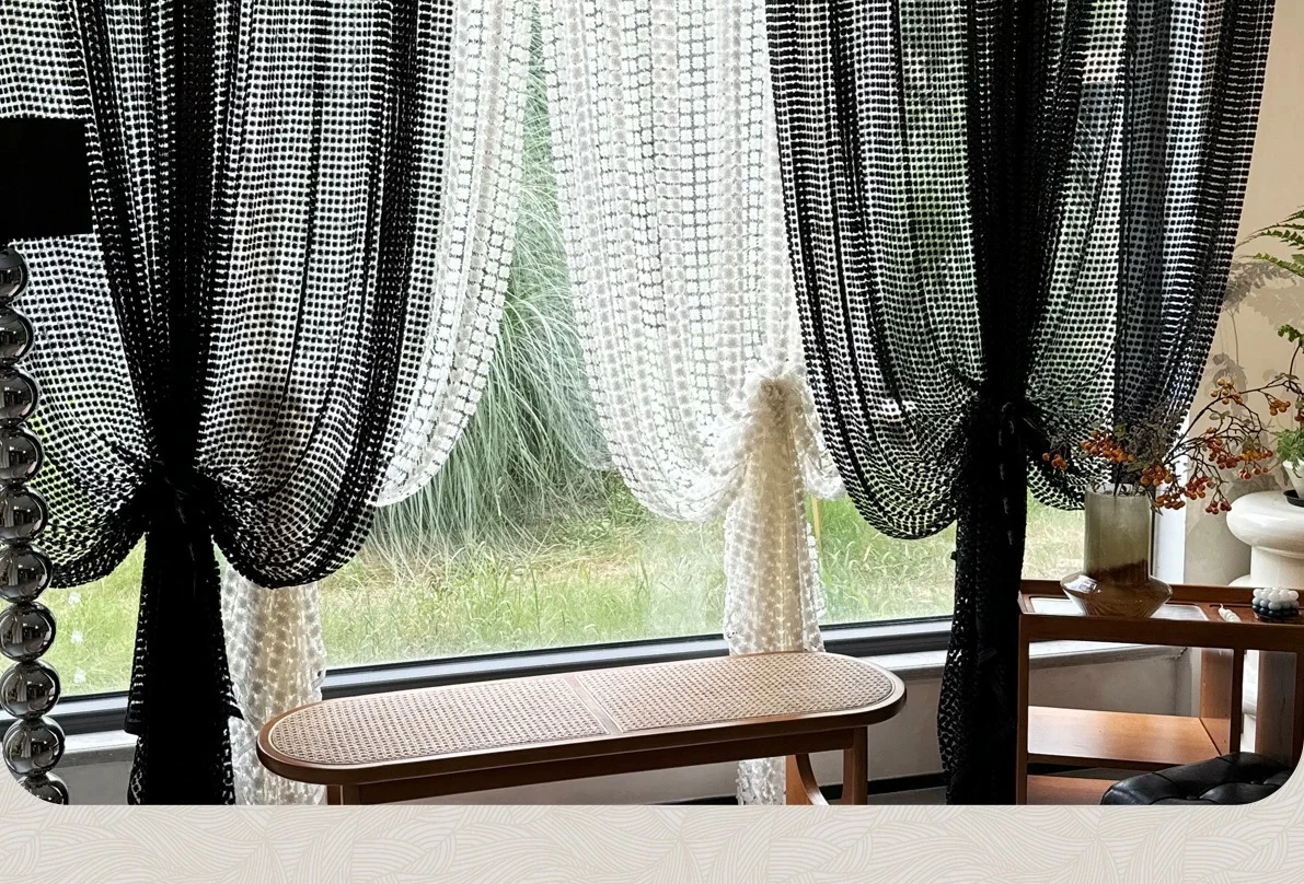 Open mesh & sculptural knot detail — close-up of the supplied curtain photograph.
