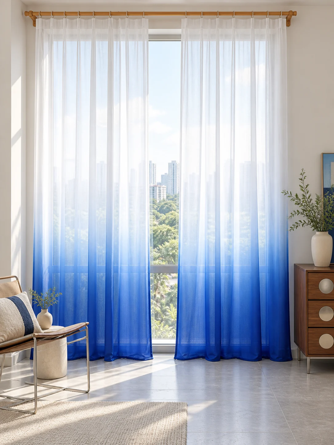 Airy white sheer upper curtain gradually fades into saturated cobalt blue at bottom third, smooth ombre transition not hard horizontal seam — full-window AI design visualisation.